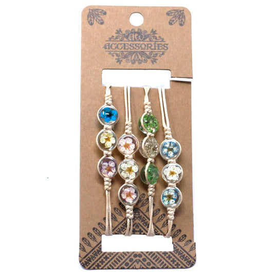 Pulsera de tres flores prensadas