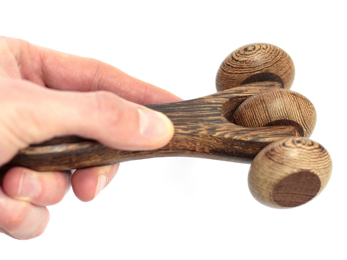 Rodillo de masaje de madera con tres discos